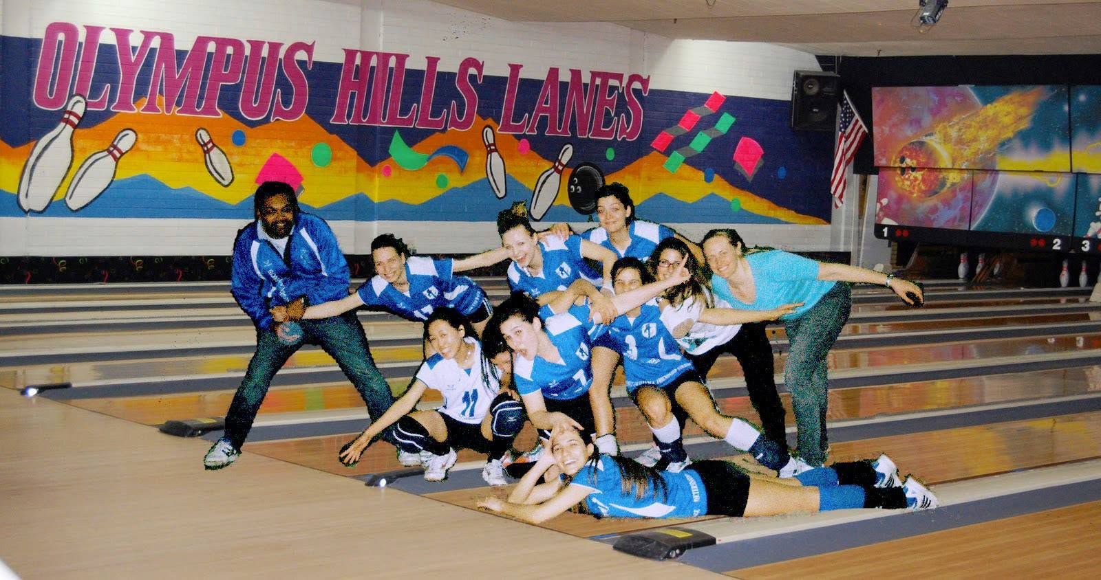 Lionhearts players clowning around on the lanes at a club bowling social